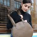 Meghan | Vegan Leather Women's Round Tote Bag | Brown from GUNAS New York in sustainable canvas tote bags, sustainable designer bags