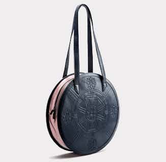 Meghan | Vegan Leather Women's Round Tote Bag | Navy & Rose from GUNAS New York in sustainable canvas tote bags, sustainable designer bags