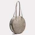 Meghan | Vegan Leather Women's Round Tote Bag | Silver from GUNAS New York in sustainable canvas tote bags, sustainable designer bags