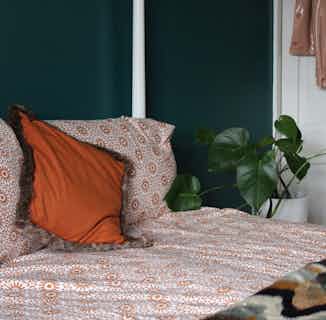 Surat | Fair Trade Organic Duvet Cover Set | Orange & White Pattern from Their story in fair trade bedding, eco-friendly bedroom products