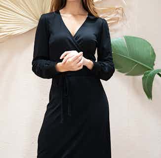 Nénuphar | TENCEL® Wrap Midi- Dress with V Neckline | Black from Avani in ethical dresses for women, ethical skirts & dresses