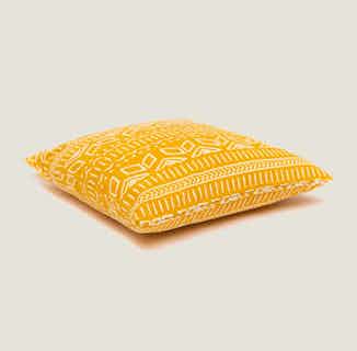 Iman | Recycled Cotton Print Cushion Cover | Mustard Yellow from Tikauo in sustainable cushion covers, sustainable furnishings