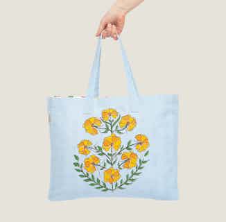 Zareen | Recycled Cotton Beach Tote Bag | Blue Yellow Floral from Tikauo in reusable shopping tote bags, eco-friendly household items