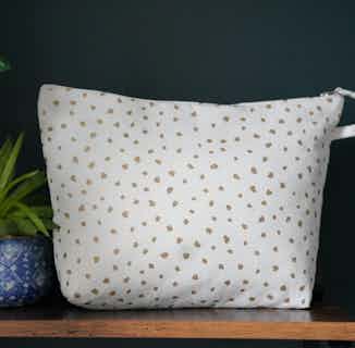 Mirage | Recycled Cotton & Biodegradable Plastic Dot Wash Bag | Gold & Cream from Tikauo in Sustainable Homeware & Leisure