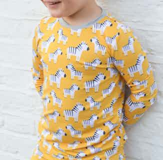 Zebra Stripe | Unisex Kids Bamboo Pyjamas Set | Orange from Nightire in sustainable boys pyjamas, sustainable boys clothing